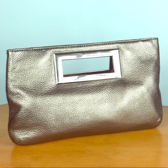 Michael Kors Handbags - Michael Kors 🌺 Berkley Metallic Silver Clutch Bag